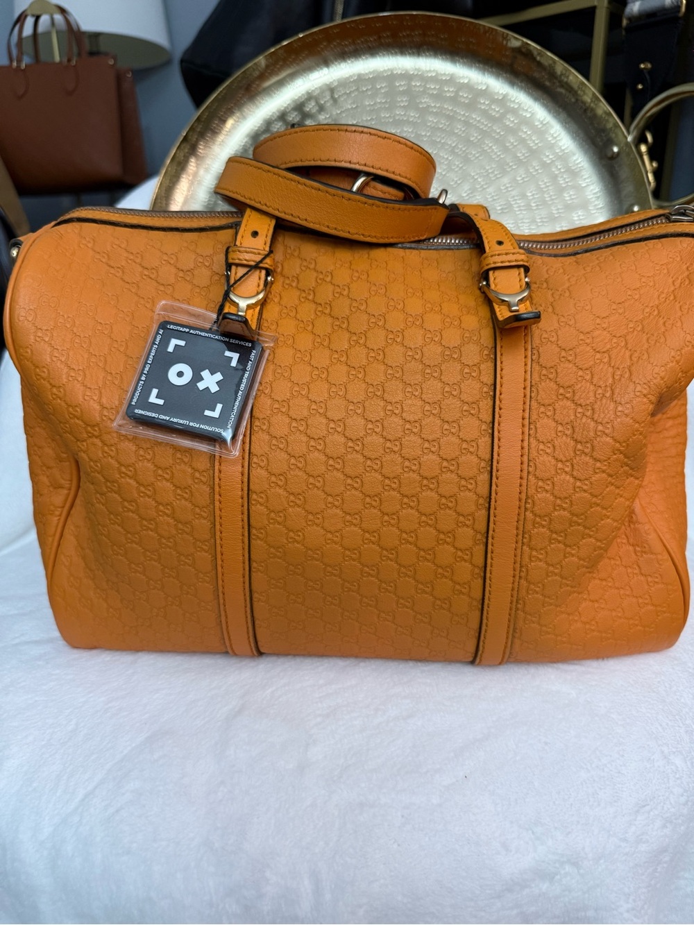 Gucci Orange Guccisimo Monogram Leather crossbody.